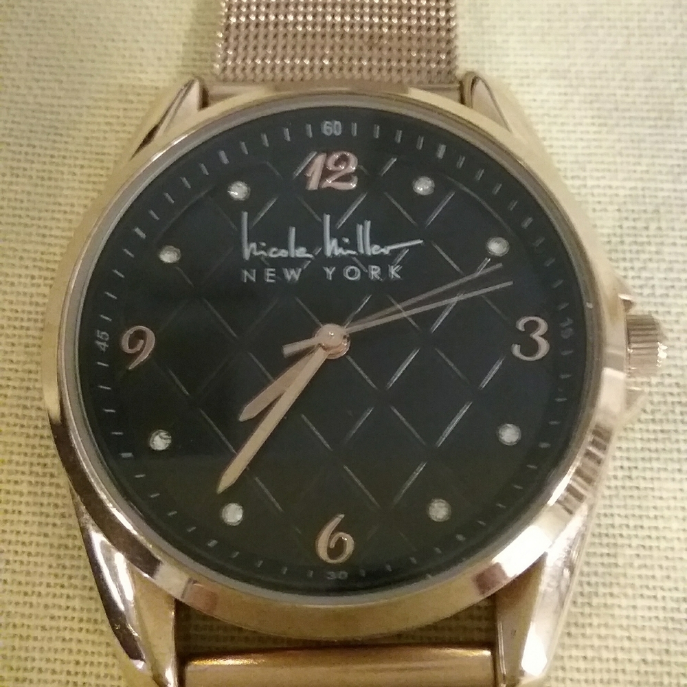 Nicole Miller Gold Black Face Watch
